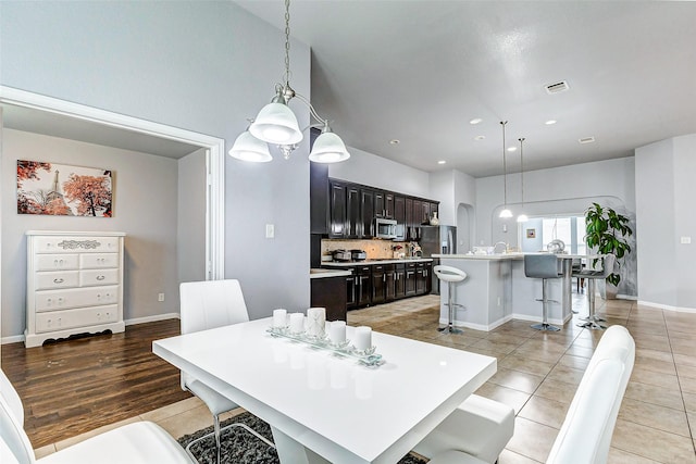 tiled dining space with sink