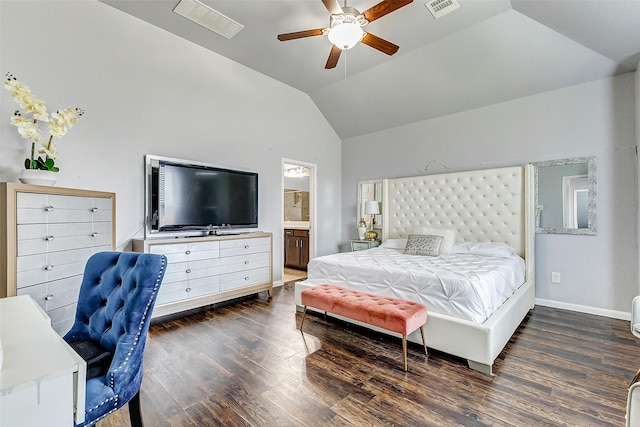 bedroom featuring vaulted ceiling, ensuite bathroom, ceiling fan, and dark hardwood / wood-style flooring