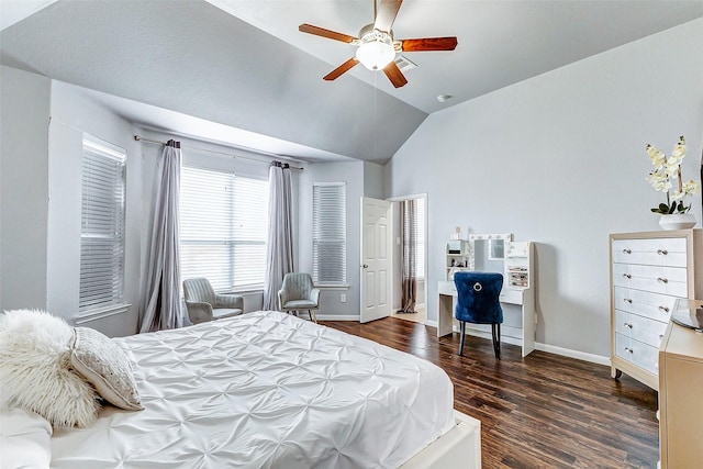 bedroom with dark wood-type flooring, ceiling fan, and vaulted ceiling