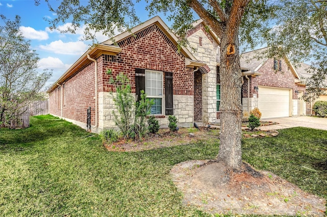 view of front property with a garage and a front yard