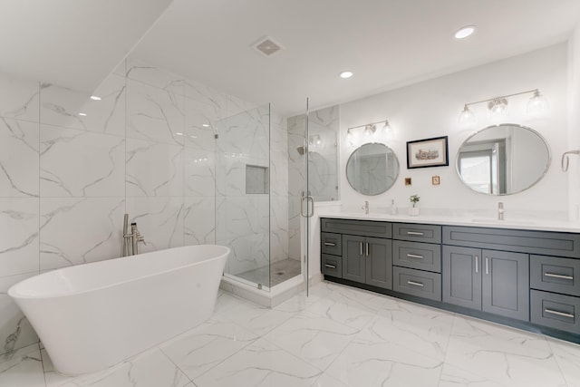 bathroom featuring plus walk in shower and vanity