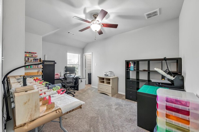 office space with light carpet, vaulted ceiling, and ceiling fan