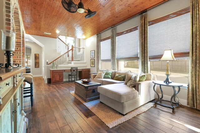 living room with wood ceiling and dark wood-type flooring