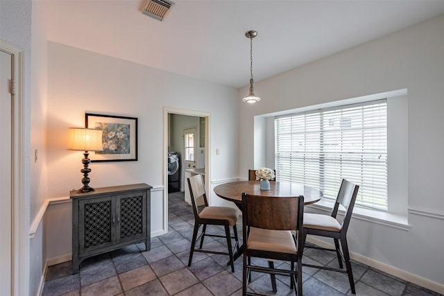 dining area featuring washer / dryer