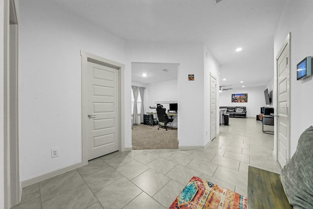 hallway with light tile patterned floors