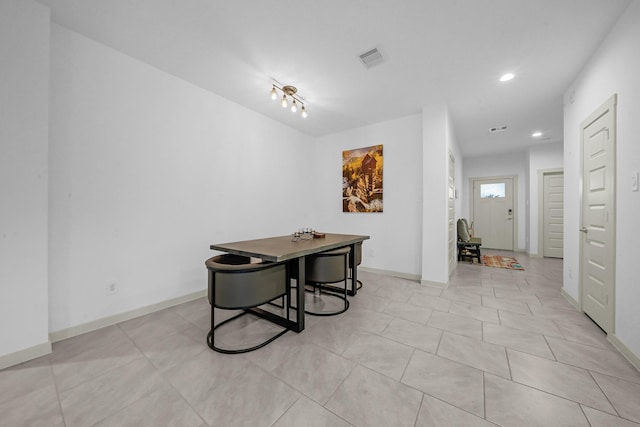 dining room with light tile patterned floors