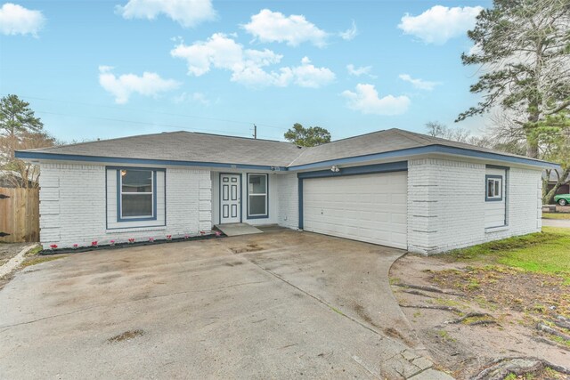 ranch-style home with a garage