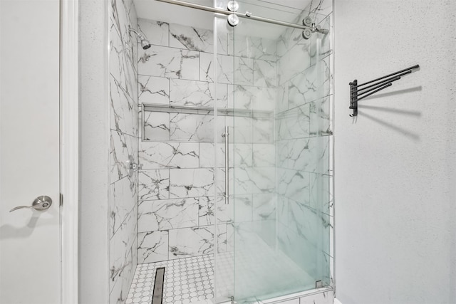 bathroom featuring an enclosed shower