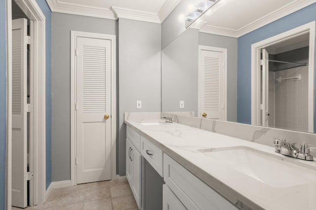 bathroom featuring vanity, ornamental molding, and tile patterned floors