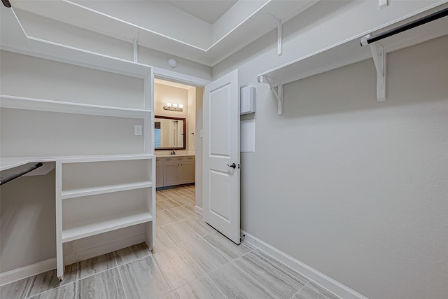 spacious closet with sink