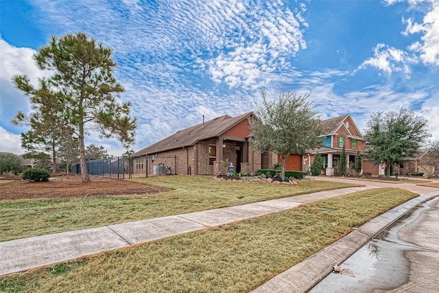 view of front facade with a front lawn