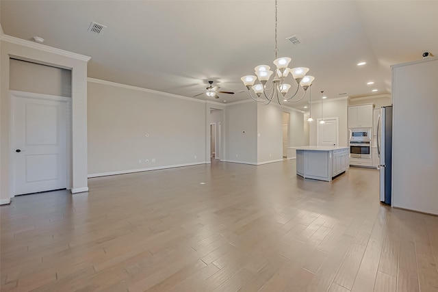 unfurnished living room with ceiling fan with notable chandelier, light hardwood / wood-style flooring, and ornamental molding