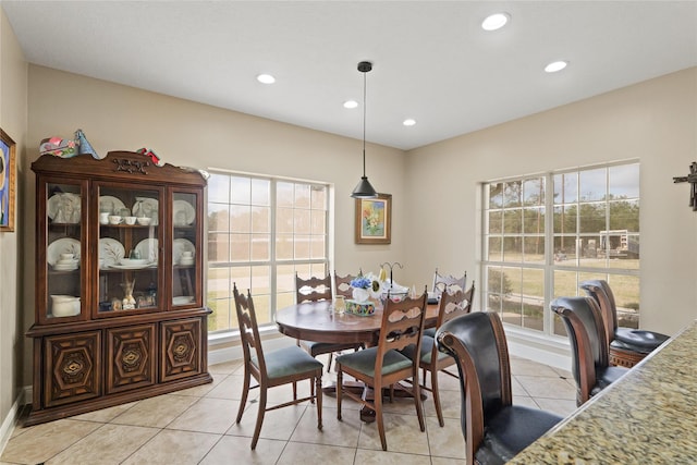 tiled dining area with plenty of natural light