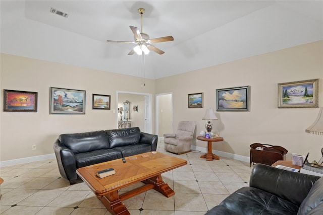 living room with ceiling fan and light tile patterned flooring