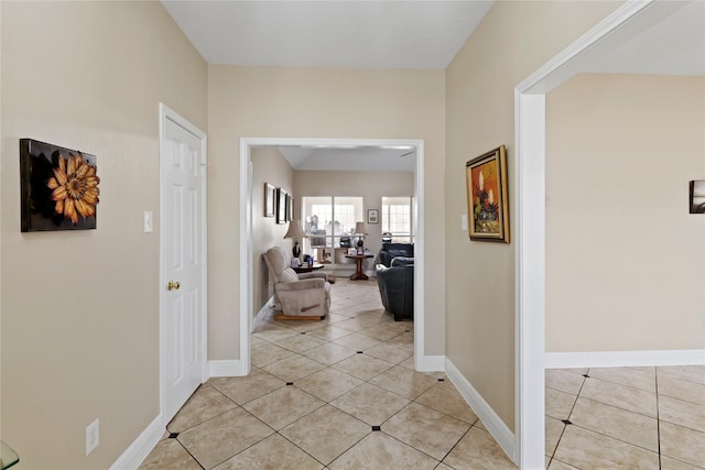 corridor with light tile patterned floors