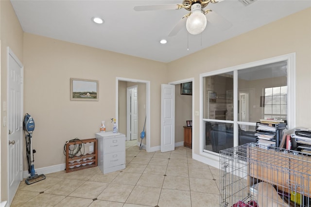 bathroom featuring tile patterned flooring and ceiling fan