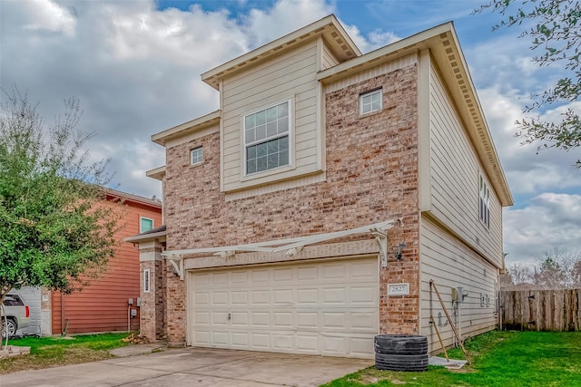 view of side of home with a garage