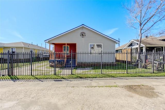 view of front of house featuring a fenced front yard and a front yard