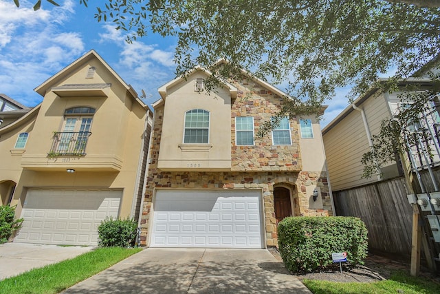 view of front of property with a garage