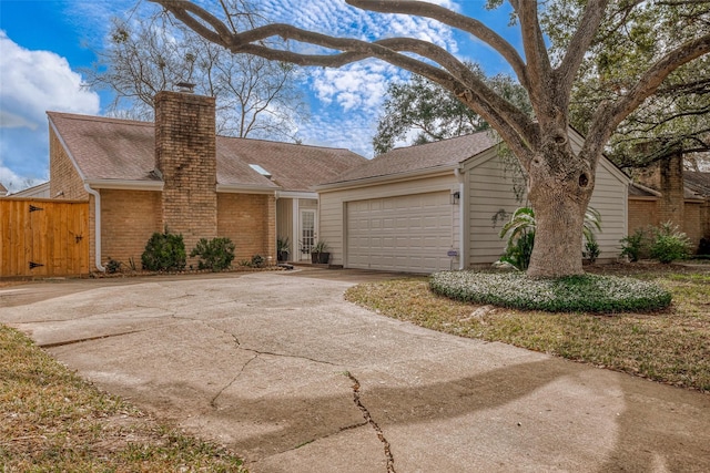 single story home featuring a garage