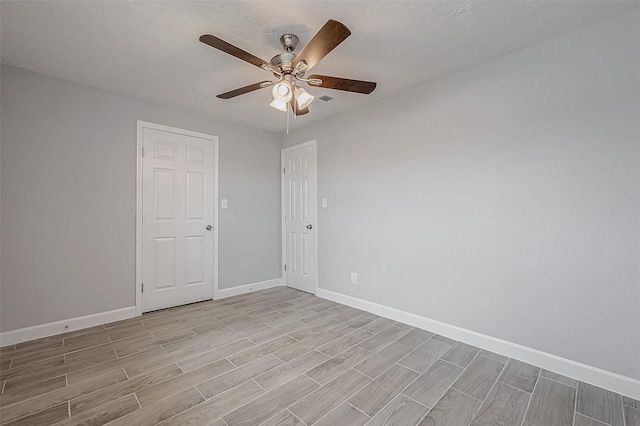 empty room with ceiling fan