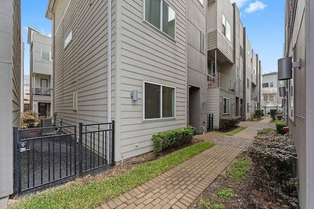 view of side of property featuring cooling unit