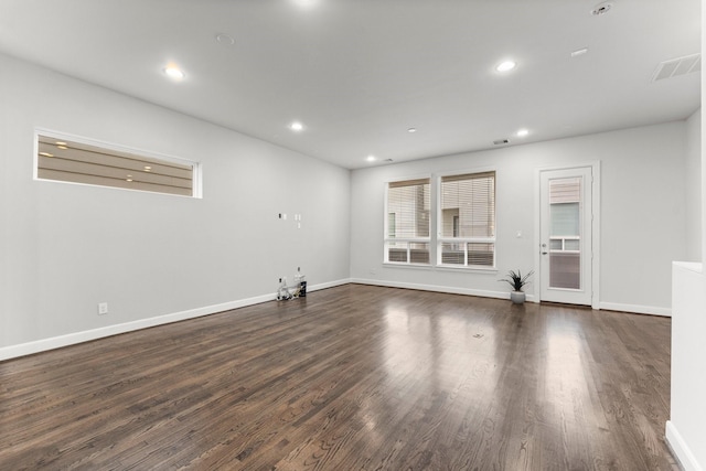 empty room featuring dark wood-type flooring