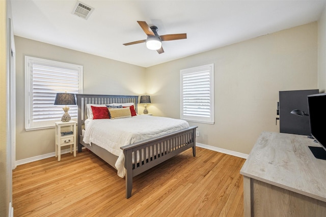 bedroom featuring light hardwood / wood-style flooring and ceiling fan