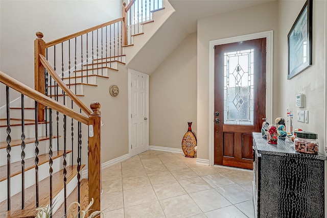 entryway with light tile patterned floors