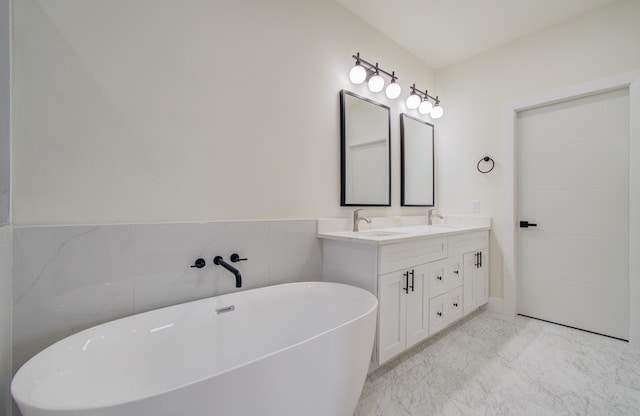 bathroom featuring vanity and a bathtub