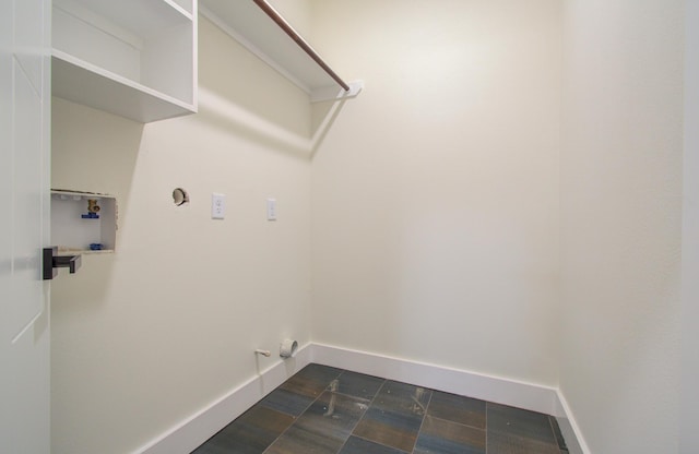 clothes washing area featuring hookup for a gas dryer, electric dryer hookup, and washer hookup