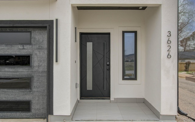 doorway to property featuring elevator