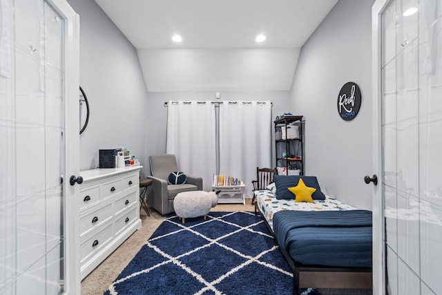 living area featuring lofted ceiling and carpet floors