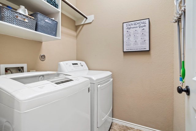 clothes washing area with independent washer and dryer