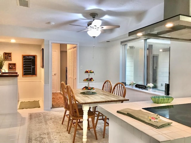 dining room with ceiling fan