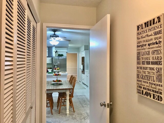 hallway with concrete flooring