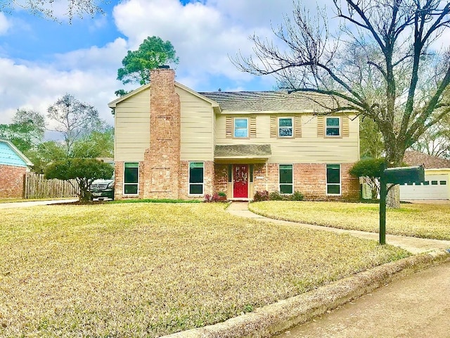 view of front of home with a front yard