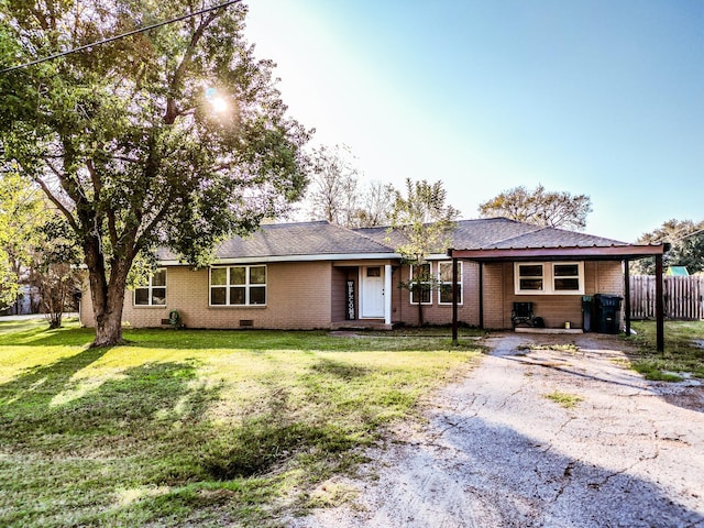 ranch-style house with a front yard