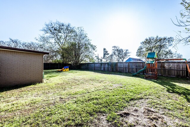 view of yard featuring a playground