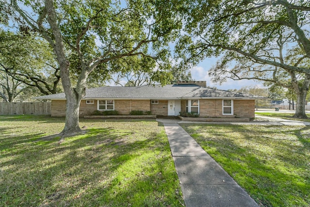 ranch-style house with a front yard