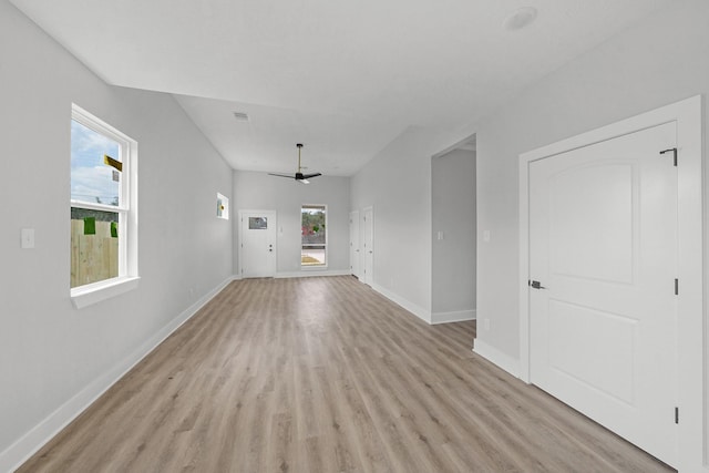 unfurnished living room with light hardwood / wood-style floors and ceiling fan