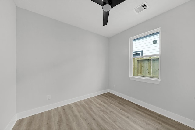 spare room featuring ceiling fan and light hardwood / wood-style floors