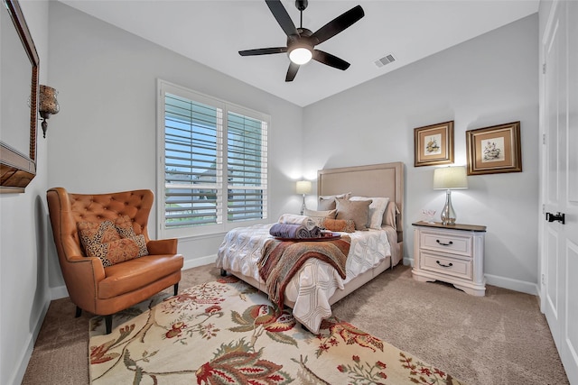 bedroom with ceiling fan and carpet floors