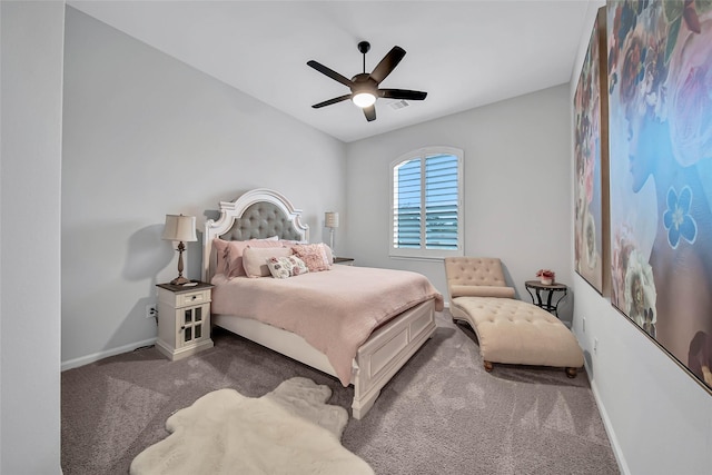 carpeted bedroom with lofted ceiling and ceiling fan