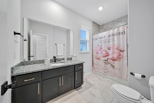 full bathroom with vanity, toilet, and shower / bath combo with shower curtain