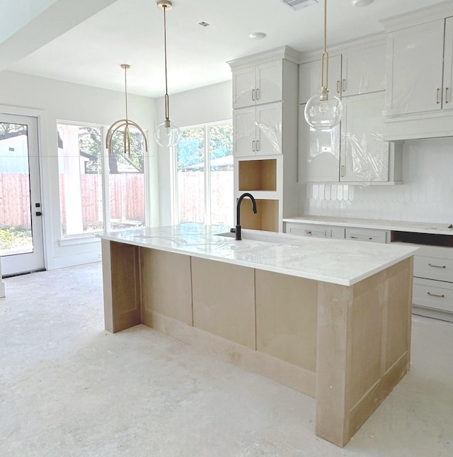 7913 Turquoise Ln, Houston, TX 77055 - kitchen with a large island, a sink, and plenty of natural light