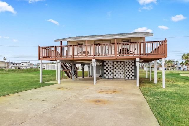 view of patio / terrace featuring a wooden deck and a carport