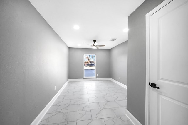 unfurnished room featuring ceiling fan