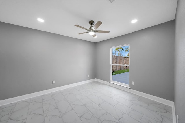 spare room featuring ceiling fan