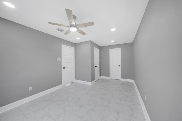 unfurnished room with ceiling fan